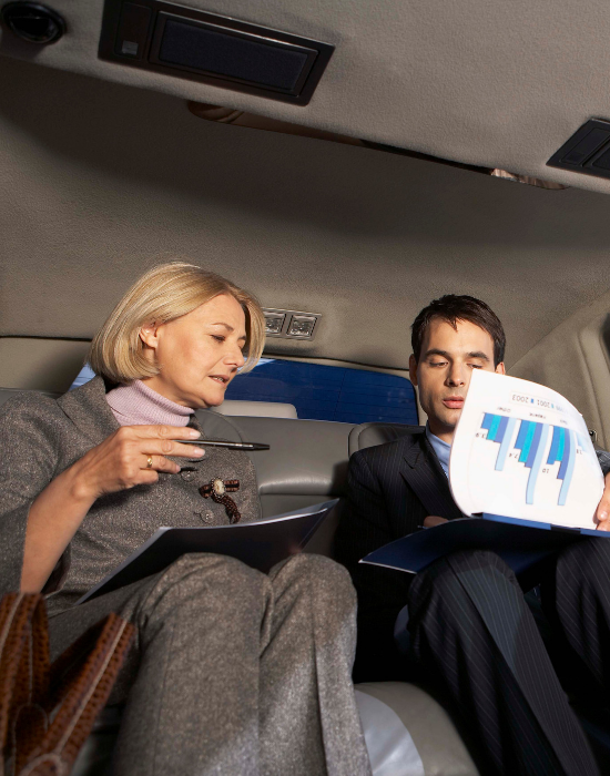 Corporate enjoying work in Limo